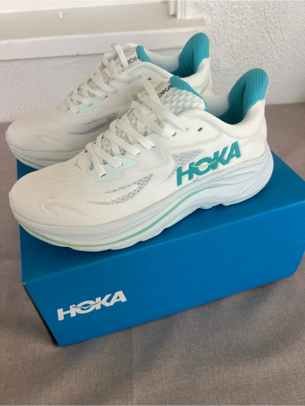 Hoka Women's White and Teal Cushioned Running Shoes